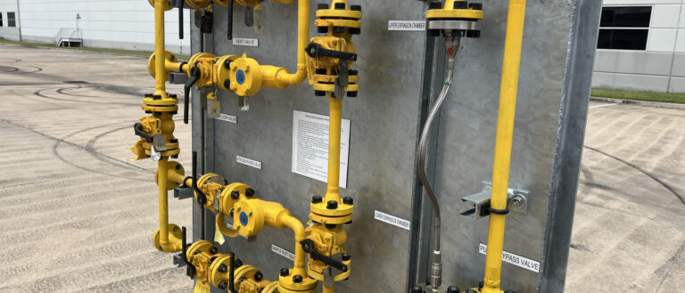AES-fabricated sample system with yellow process piping, flanged valves and tagged inlets